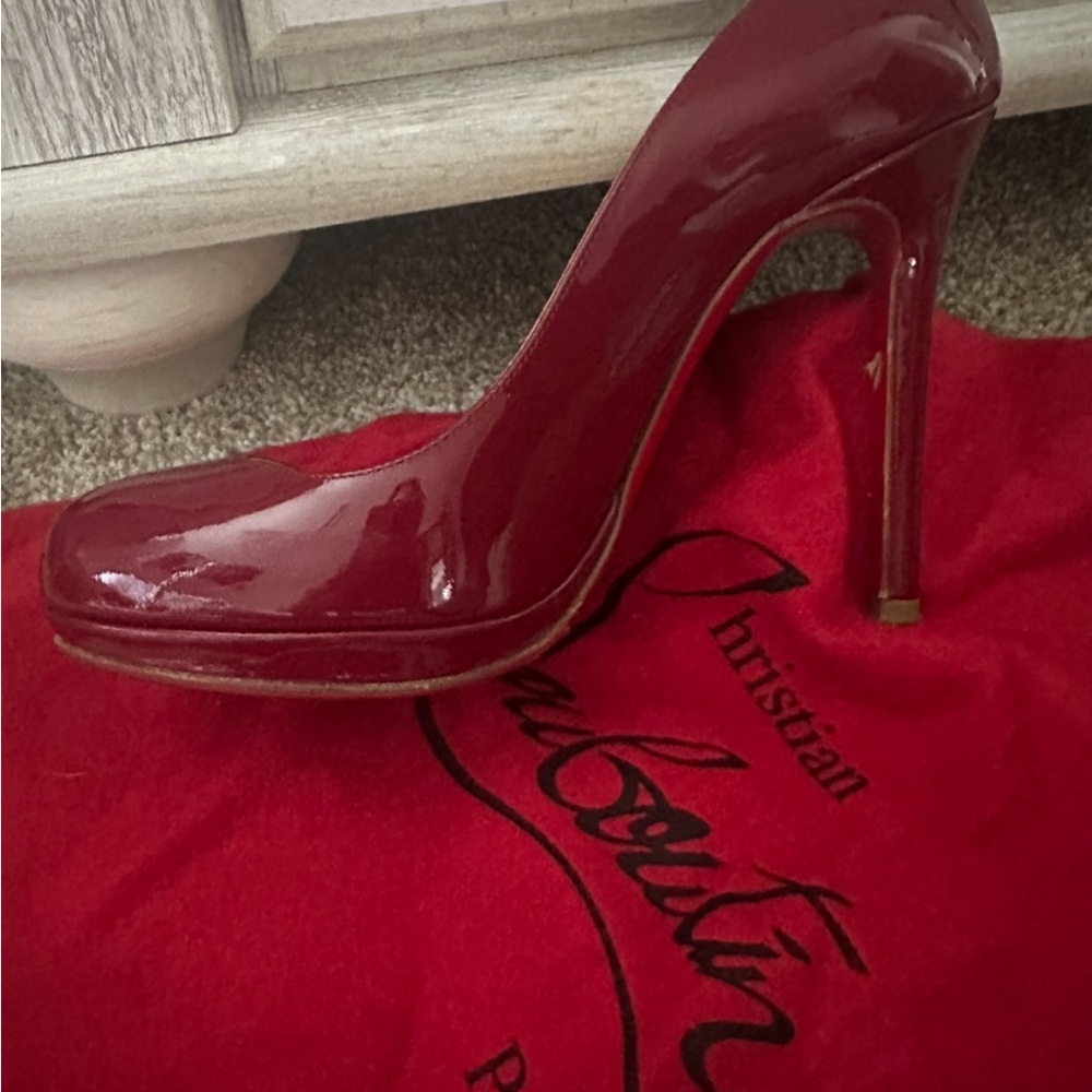 Christian Louboutin Stiletto Heels
One red pair, one nude pair, one black pair